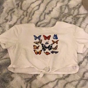 White crop top with butterfly design